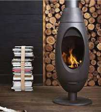 Печь-камин Invicta OVE стальная в интерьере Амазонка бай фото в Гродно