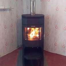 Недорогой камин с отделкой шамотом Сибирь 12 фото в интерьере в Гродно