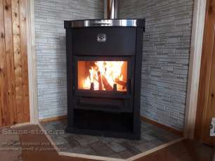 Стальной недорогой камин Теплодар ОВ-120 (угловой) фото в интерьере в Гродно