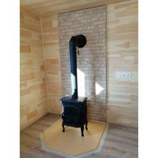 Чугунный камин со стеклом Сибирь 7 фото в интерьере в Гродно