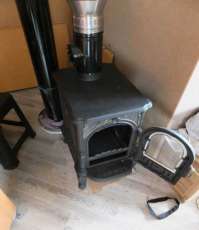 Недорогой печь-камин со стеклом Сибирь 6 фото в интерьере в Гродно