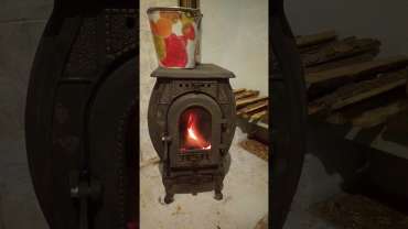 Печь отопительно-варочная чугунная "Сибирь" фото в интерьере в Гродно