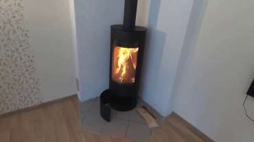 Стильная печь-камин с шамотом Мета-Бел Селигер в Гродно фото в интерьере в Гродно