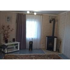 Стальной камин с шамотом Мета-Бел Ритм L фото в интерьере в Гродно