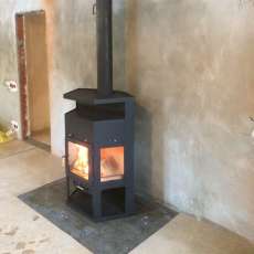 Купить недорогой камин с шамотом Мета-Бел Енисей в Гродно фото в интерьере в Гродно