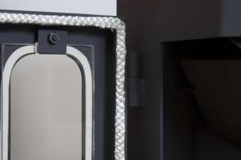 Стальной недорогой камин Бавария призматик пристенно-угловой фото в Гродно