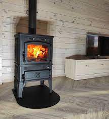 Печь-камин чугунный FireWay Dacha в интерьере чёрный Амазонка бай фото в Гродно