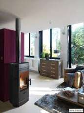 Печь-камин чугунный Invicta Gomont в интерьере Амазонка бай фото в Гродно