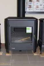 Печь-камин чугунный Invicta Carolo в интерьере Амазонка бай фото  в Гродно