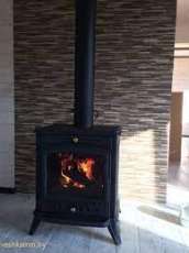 Печь-камин чугунный Invicta Altea в интерьере Амазонка бай фото в Гродно