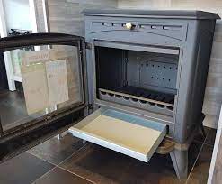 Печь-камин чугунный Invicta Altea в интерьере Амазонка бай фото в Гродно