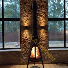 Печь-камин чугунный Invicta Pow-Wow в интерьере Амазонка бай фото в Гродно