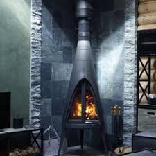 Печь-камин чугунный Invicta Pow-Wow в интерьере Амазонка бай фото в Гродно