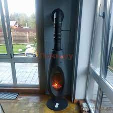 Печь-камин чугунный Invicta OVATIO в интерьере Амазонка бай фото в Гродно