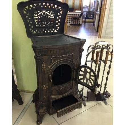 Печка чугунная Амбра в интерьере Амазонка бай фото в Гродно